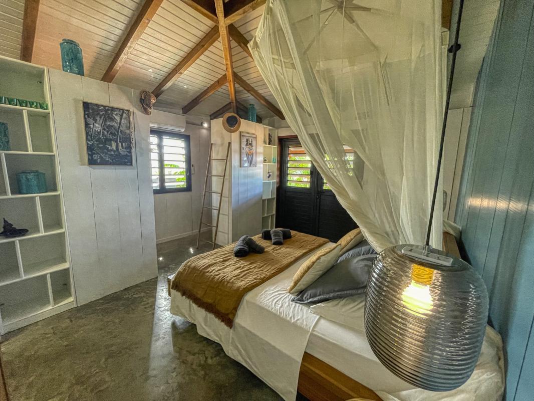 24 Location villa piscine vue mer Pointe Noire Guadeloupe_chambre 1